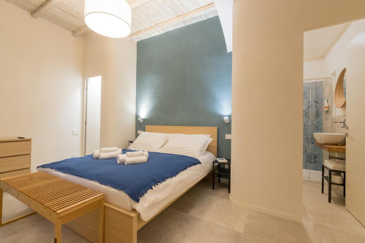 Al Caruggio Guest House Genoa Bagian luar foto